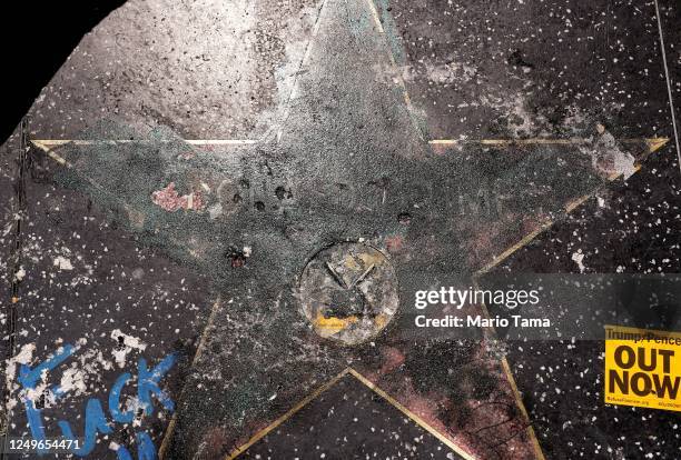 President Donald Trump's star on Hollywood Boulevard stands defaced near the starting point of the All Black Lives Matter solidarity march, replacing...