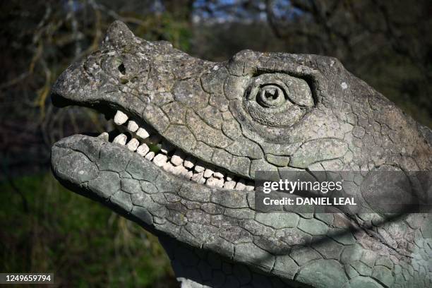 The head of a Dinosaur, created by sculptor Benjamin Waterhouse Hawkins is seen in Crystal Palace Park in south London on March 27 following news...