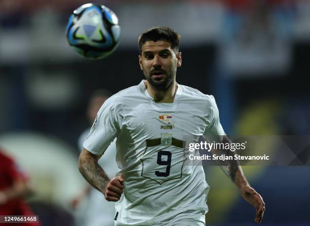 Aleksandar Mitrovic of Serbia in action during the UEFA EURO 2024 qualifying round group B match between Montenegro and Serbia at Podgorica City...