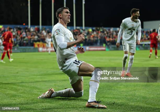 Dusan Vlahovic of Serbia celebrates after scoring a goal during the UEFA EURO 2024 qualifying round group B match between Montenegro and Serbia at...