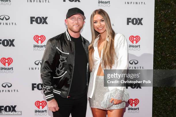 Cole Swindell and Courtney Little at the 2023 iHeartRadio Music Awards held at The Dolby Theatre on March 27, 2023 in Los Angeles, California.