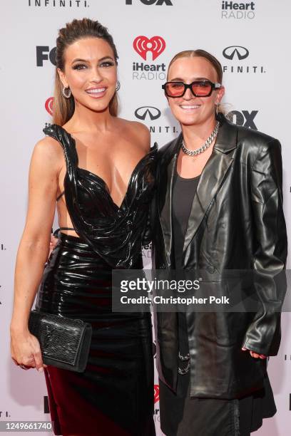 Chrishell Stause and G Flip at the 2023 iHeartRadio Music Awards held at The Dolby Theatre on March 27, 2023 in Los Angeles, California.