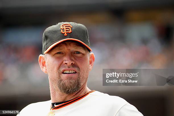 Aubrey Huff of the San Francisco Giants stands in the dugout during their game against the Arizona Diamondbacks at AT&T Park on September 4, 2011 in...