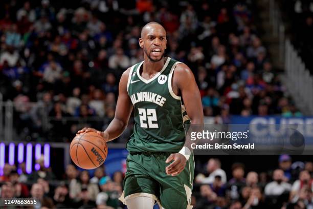 Khris Middleton of the Milwaukee Bucks dribbles the ball against the Detroit Pistons on March 27, 2023 at Little Caesars Arena in Detroit, Michigan....