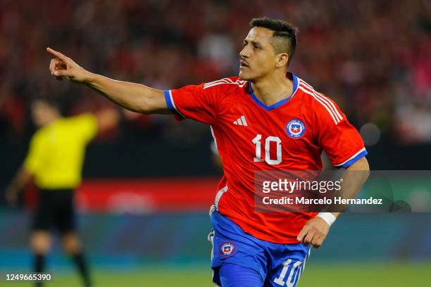 Alexis Sanchez of Chile celebrates after scoring the second goal of his team during an international friendly match against Paraguay at Estadio...