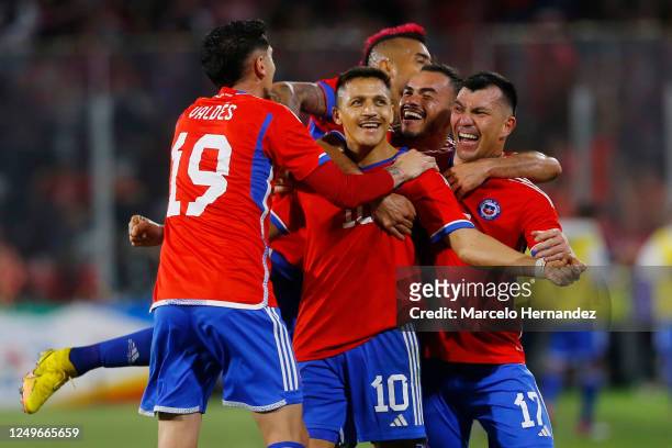 Alexis Sanchez of Chile celebrates with teammates after scoring the second goal of his team during an international friendly match against Paraguay...