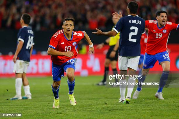 Alexis Sanchez of Chile celebrates after scoring the second goal of his team during an international friendly match against Paraguay at Estadio...