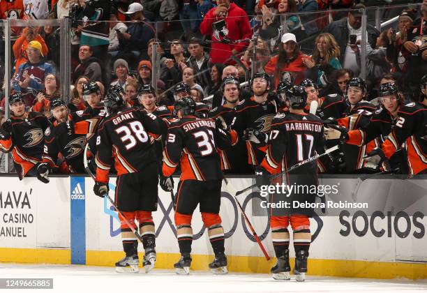 Derek Grant of the Anaheim Ducks celebrates his goal with teammates during the first period against the Colorado Avalanche at Honda Center on March...