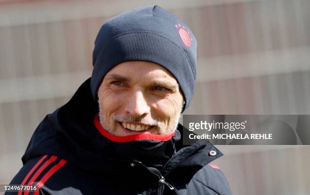 Newly-appointed Bayern Munich coach Thomas Tuchel smiles as he oversees his first training session at German first division Bundesliga football club...