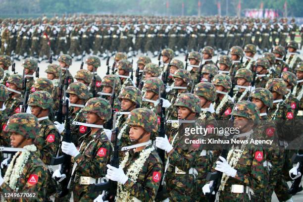 Soldiers march during a military parade to mark the 78th Armed Forces Day in Nay Pyi Taw, Myanmar, March 27, 2023. Myanmar celebrated its 78th Armed...