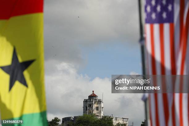 General view of US and Ghana flags at the Cape Coast Castle in Cape Coast, Ghana, on March 28 ahead of US Vice President Kamala Harris' vist. - US...