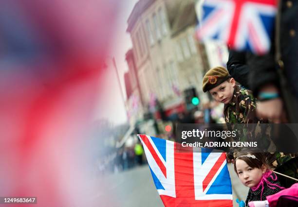 Six-year-old boy Henry Leeson looks for his father taking part in the 3rd Battalion the Yorkshire Regiment pre-deployment parade in Warminster, in...