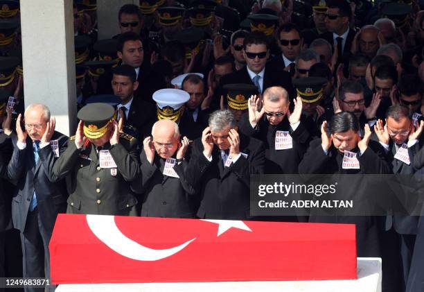 Turkey's President Abdullah Gul , Parliament Speaker Cemil Cicek , Prime Minister Recep Tayyip Erdogan , Chief of General Staff Necdet Ozel pray near...