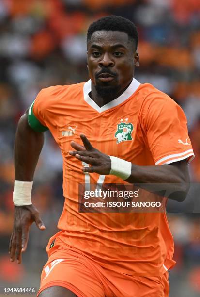 Ivory Coast's Serge Aurier runs during the 2023 Africa Cup of Nations Group H qualifier match between Ivory Coast and Comoros at Stade Bouake in...