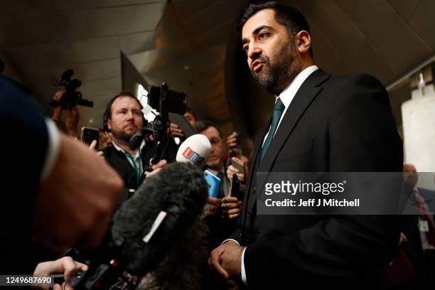 Newly elected leader of the Scottish National Party Humza Yousaf speaks to the media at the Scottish Parliament on March 28, 2023 in Edinburgh,...