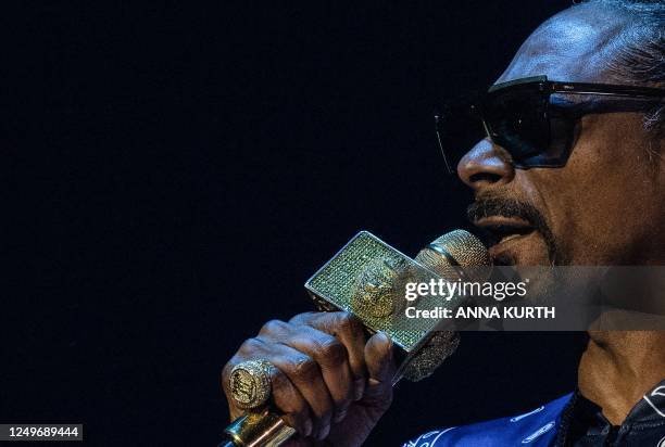 Rapper Calvin Cordozar Broadus Jr aka Snoop Dogg performs on stage at the Bercy Accor Arena, in Paris, on March 25, 2023.