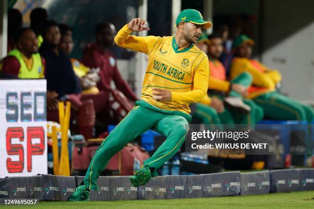 South Africa's Reeza Hendricks reacts while fielding a ball during the third T20 international cricket match between South Africa and West Indies at...