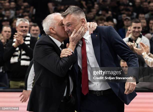 Head coach Zeljko Obradovic of Partizan kisses the Head coach Sarunas Jasikevicius of Barcelona enter the court prior to the 2022-23 Turkish Airlines...