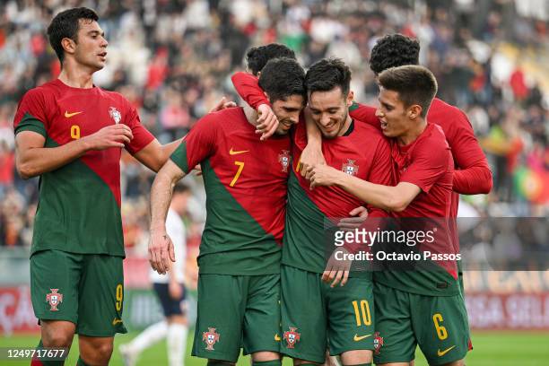 Afonso Sousa of Portugal U21 celebrates with teammates after scores his sides first goal during the International Friendly match between Portugal U21...