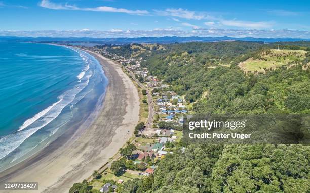 aerial view of the popular tourist beach of ohope beach, north island of new zealand - new zealand beach house stock pictures, royalty-free photos & images