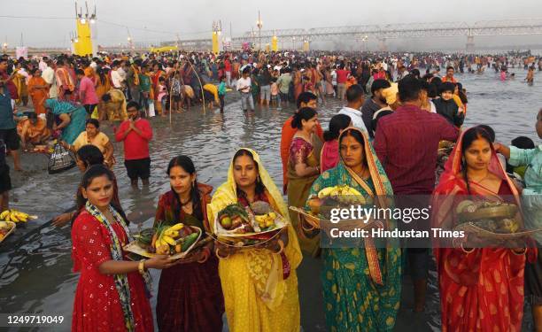 Chhath devotees perform rituals in Ganga river at Digha Ghat on the occasion of Chaiti Chhath Puja on March 28, 2023 in Patna, India.
