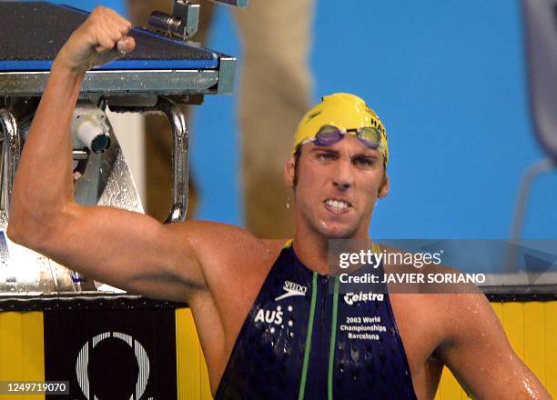 Australia's Grant Hackett jubilates after he won the men's 1500m freestyle final, 27 July 2003 in Barcelona, at the 10th FINA Swimming World...