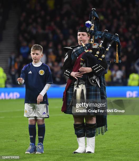 Sign language and Bagpiper during a UEFA Euro 2024 Qualifier between Scotland and Spain at Hampden Park, on March 28 in Glasgow, Scotland.