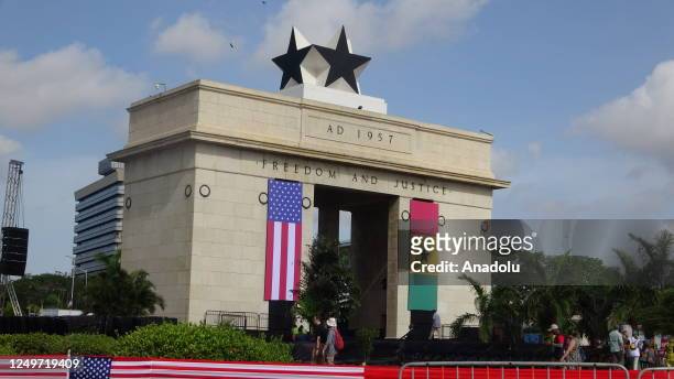 And Ghana flags are hung on a monument at Independence Square before US Vice President Kamala Harris addresses youth in Accra, Ghana on March 28,...