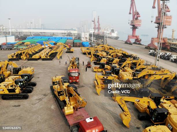 Construction machines of Caterpillar Inc. Stand ready for shipment at Lianyungang port on June 15, 2020 in Lianyungang, Jiangsu Province of China.