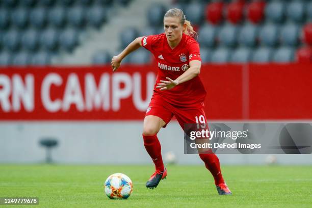 Carina Wenninger of Bayern Muenchen controls the ball during the Flyeralarm Frauen Bundesliga match between FC Bayern Munich Women's and FF USV Jena...