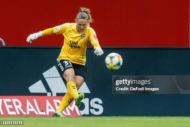 Goalkeeper Inga Schuldt of FF USV Jena controls the ball during the Flyeralarm Frauen Bundesliga match between FC Bayern Munich Women's and FF USV...