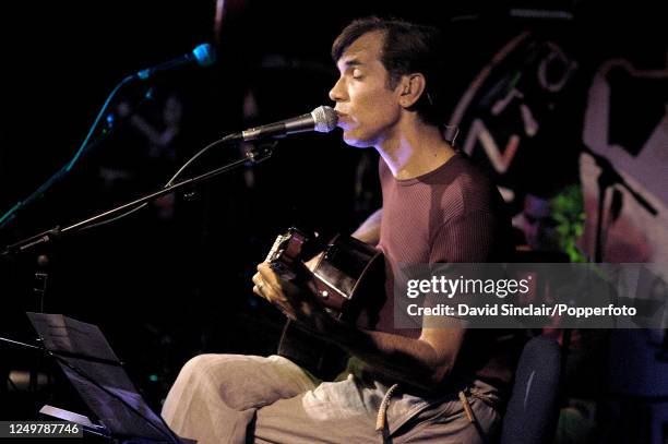 Brazilian guitarist Celso Fonseca performs live on stage in London on 16th June 2003.