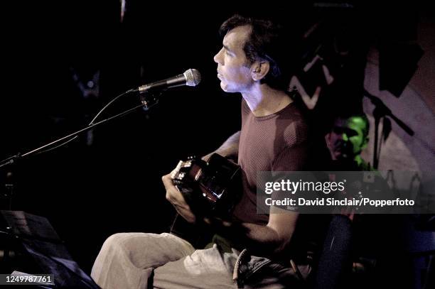Brazilian guitarist Celso Fonseca performs live on stage in London on 16th June 2003.