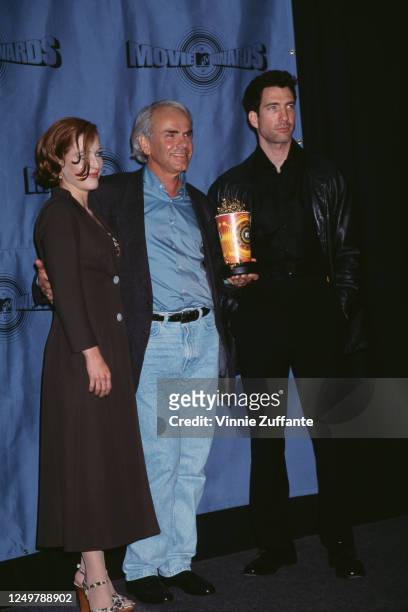 American-British actress Gillian Anderson, Dutch film director Jan de Bont, and American actor Dylan McDermott attend the 6th Annual MTV Movie...