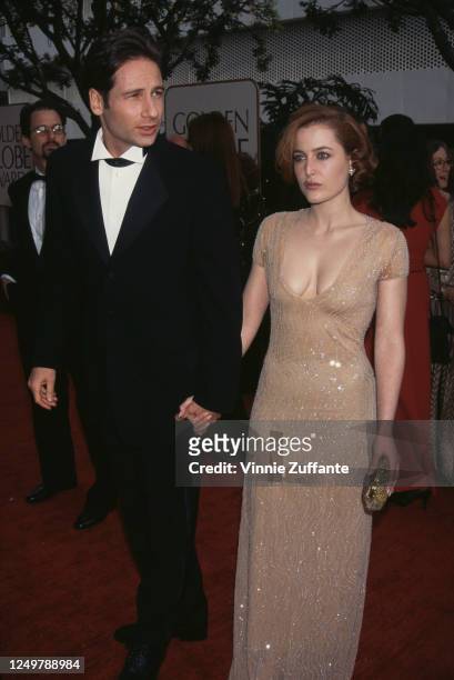 American actor David Duchovny and American-British actress Gillian Anderson attend the 54th Annual Golden Globe Awards, held at the Beverly Hilton...