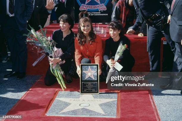 American singer and dancer Paula Abdul , with her mother, Canadian pianist Lorraine Rykiss , and sister, Wendy Mandel, during Abdul's Hollywood Walk...