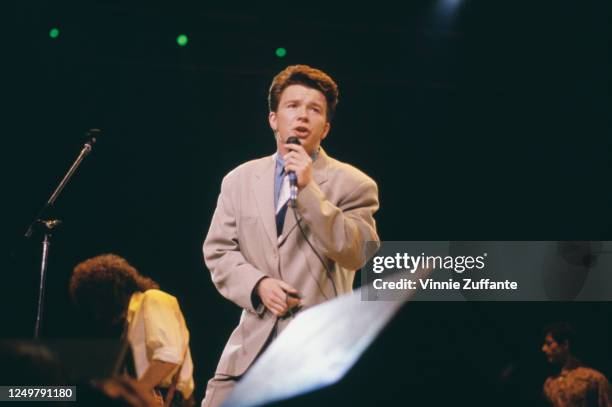 British singer Rick Astley performs live during the 1988 Prince's Trust Rock Gala, held at the Royal Albert Hall in London, England, June 1988.