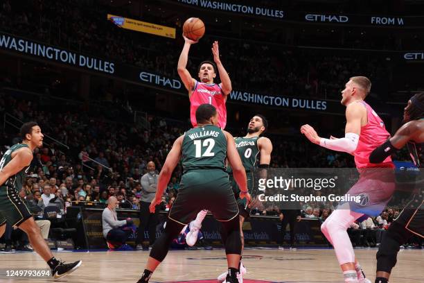 Johnny Davis of the Washington Wizards shoots the ball during the game against the Boston Celtics on March 28, 2023 at Capital One Arena in...