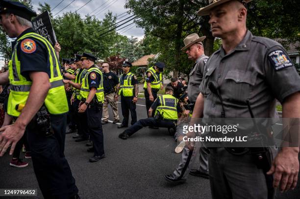 Protestors and police clash during a Black Lives Matter march in East Meadow, New York on June 12, 2020.