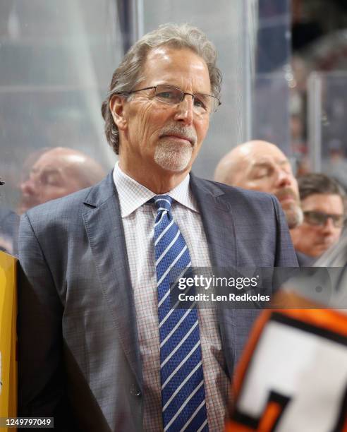 Head Coach of the Philadelphia Flyers John Tortorella looks on during the first period of his team's game against the Montreal Canadiens at the Wells...