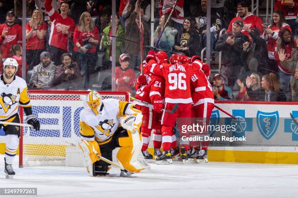 Jonatan Berggren of the Detroit Red Wings scores a goal on Casey DeSmith of the Pittsburgh Penguins during the first period of an NHL game at Little...