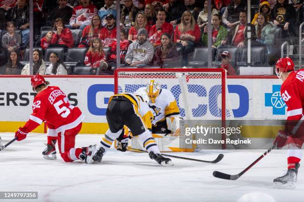 Jonatan Berggren of the Detroit Red Wings scores a goal on Casey DeSmith of the Pittsburgh Penguins during the first period of an NHL game at Little...