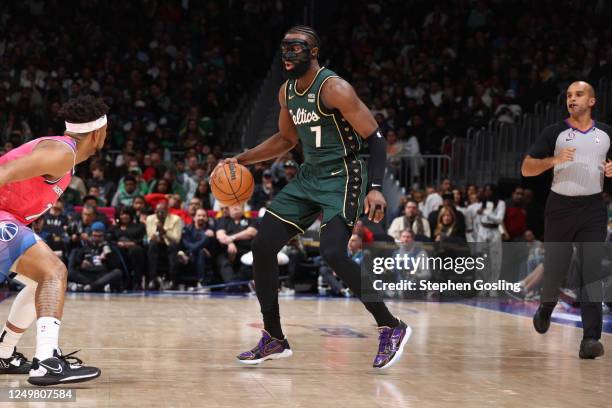 Jaylen Brown of the Boston Celtics dribbles the ball during the game against the Washington Wizards on March 28, 2023 at Capital One Arena in...