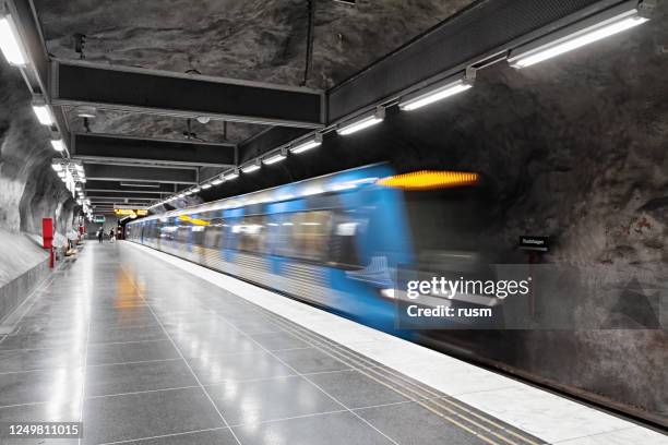 train arrive in subway station hjulsta, stockholm, sweden - stockholm metro stock pictures, royalty-free photos & images