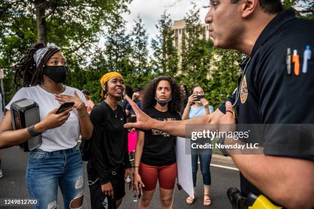 Protesters and police clash during a Black Lives Matter march in East Meadow, New York on June 12, 2020.