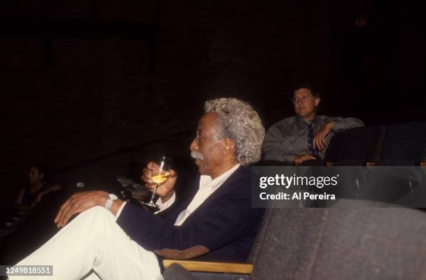 Gordon Parks sips a glass of wine when he appears at the premier for "Strapped" at the Joseph Papp Theater on August 18, 1993 in New York City.