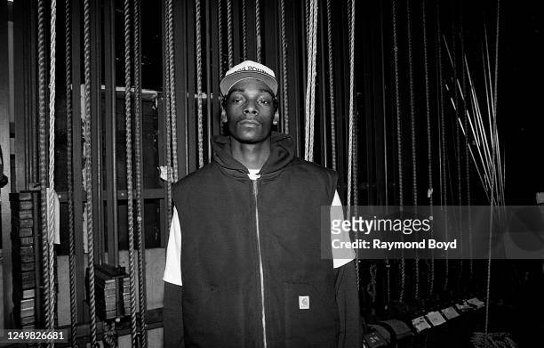 Rapper Snoop Doggy Dogg poses for photos backstage at the Regal Theater in Chicago, Illinois in January 1993.