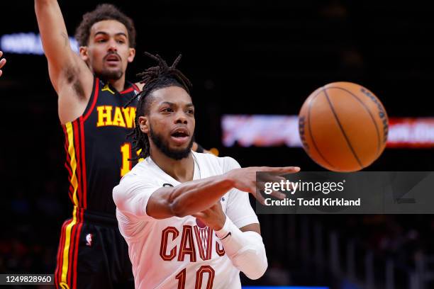 Darius Garland of the Cleveland Cavaliers passes the ball during the first half against the Atlanta Hawks at State Farm Arena on March 28, 2023 in...