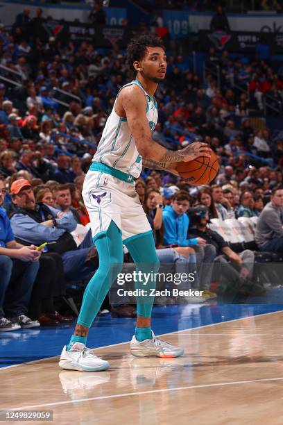 James Bouknight of the Charlotte Hornets handles the ball during the game on March 28, 2023 at Paycom Arena in Oklahoma City, Oklahoma. NOTE TO USER:...