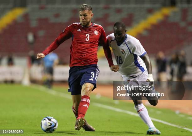 Panama's Cecilio Waterman vies for the ball with Costa Rica's Juan Pablo Vargas during their Concacaf Nations League football match at National...